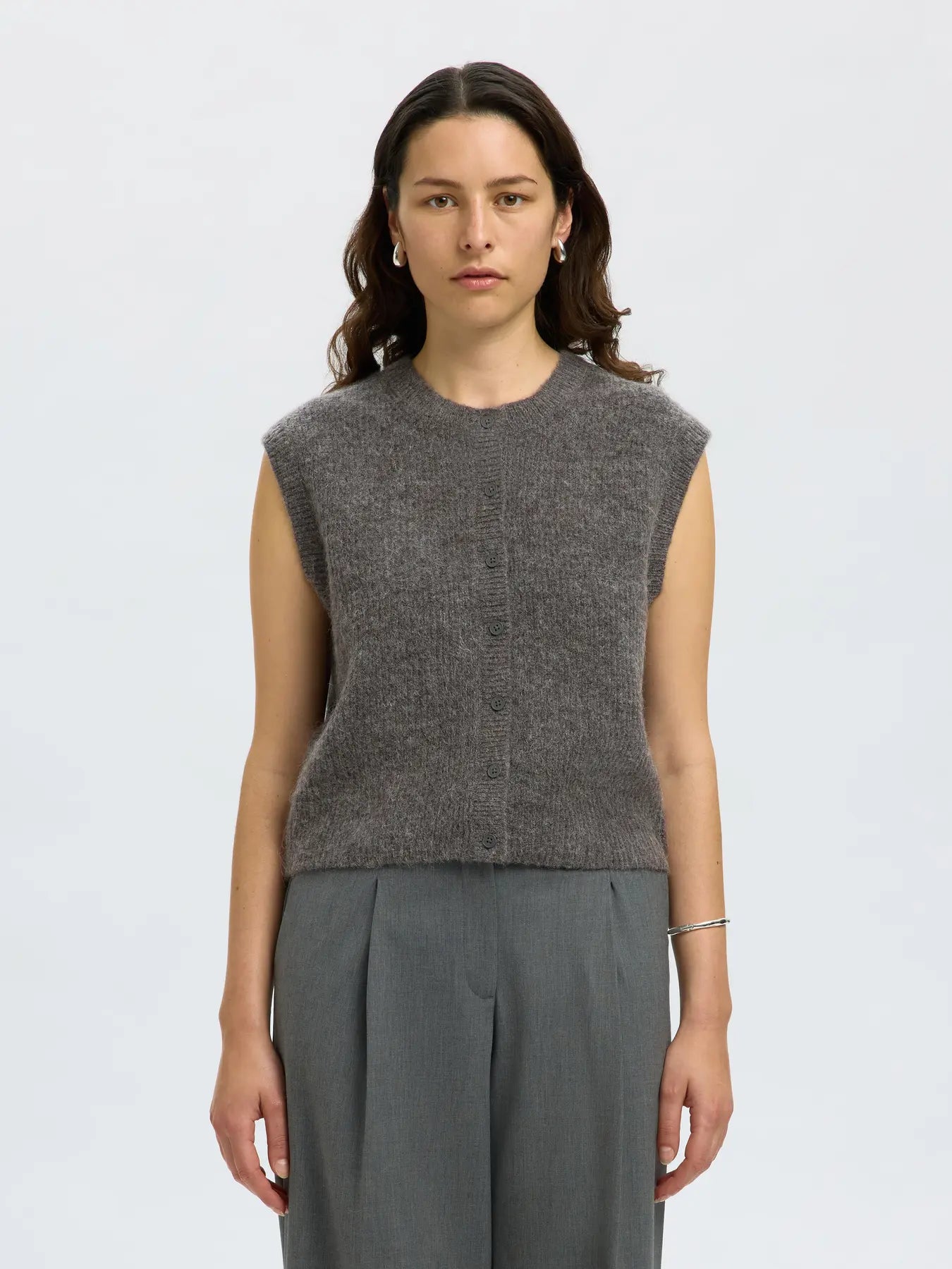 Väst Lulu button o-neck
